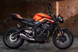 Triumph Street Triple R in orange side profile shot